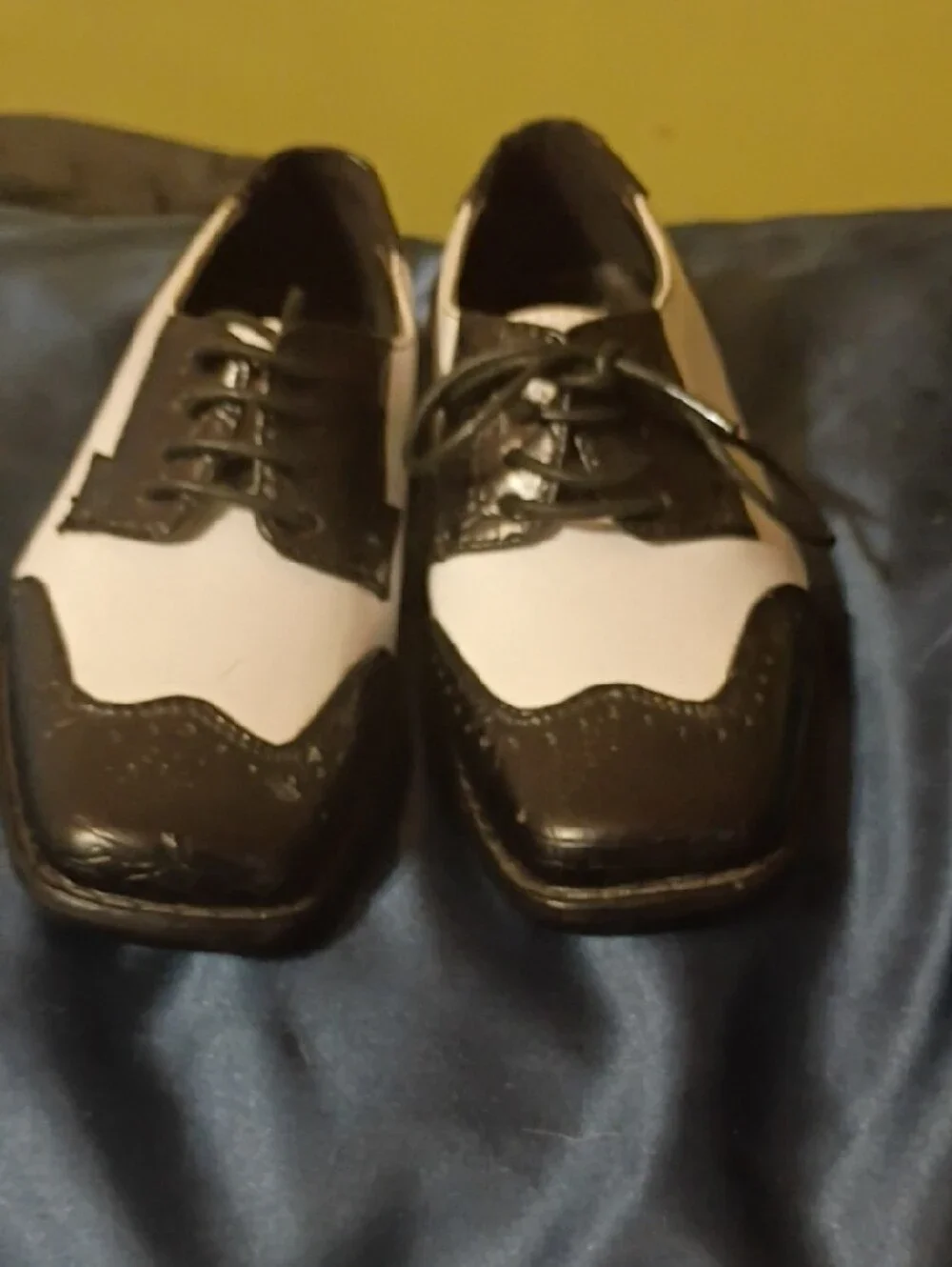 Classic Black and White Men’s Wingtip Oxfords